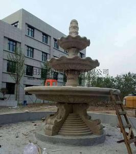北京石雕噴泉安裝實例_黃銹石歐式噴泉三層疊水